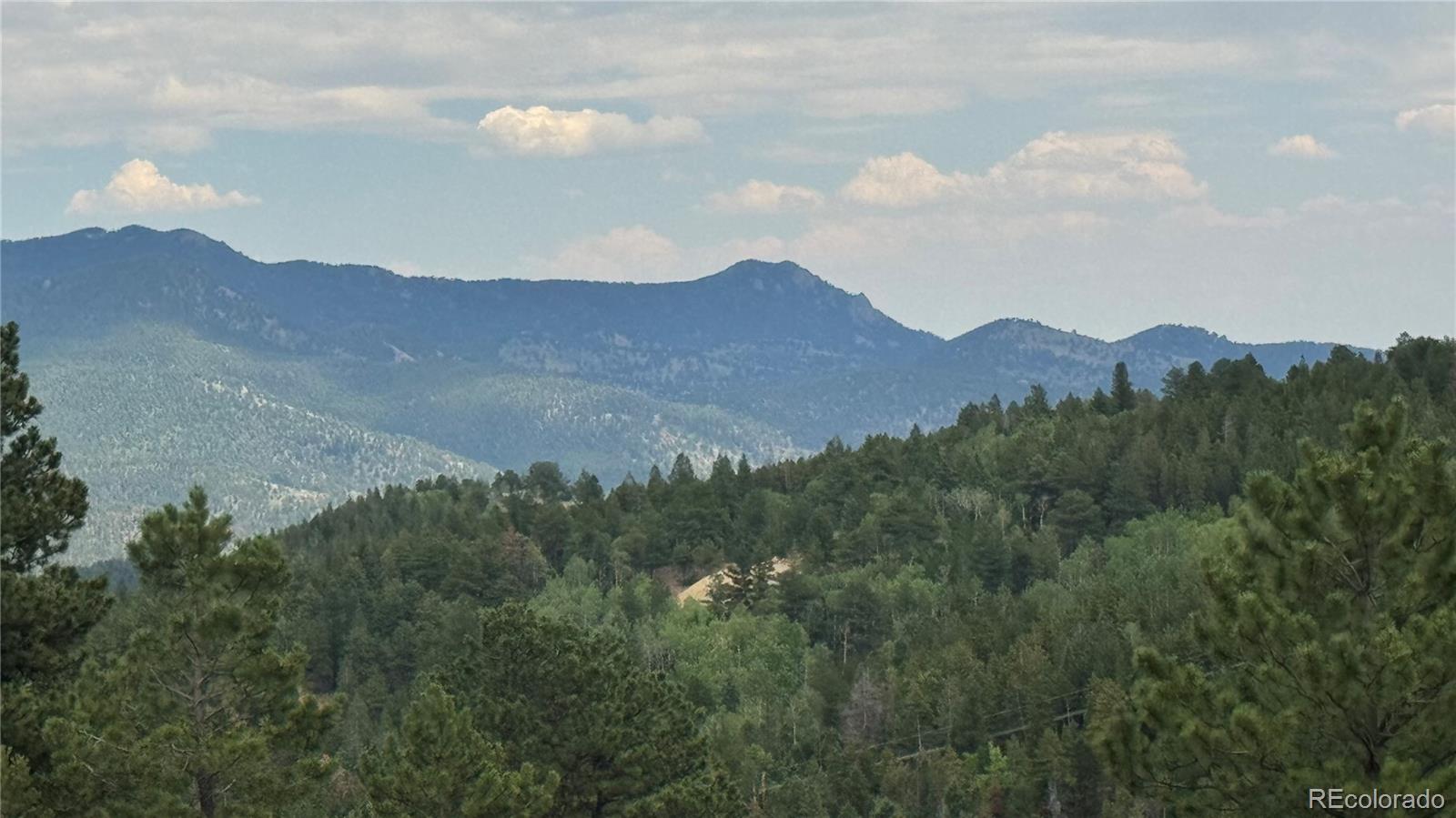 1 Church Placer Road Central City, CO 80427 - Photo 11 of 11 a view of a house with mountain view
