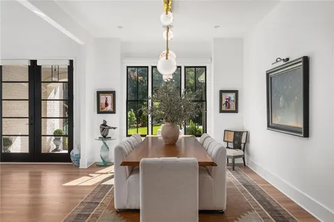a bathroom with a sink toilet and mirror