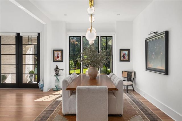 a bathroom with a sink toilet and mirror