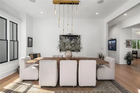 a kitchen with a stove a sink and a refrigerator