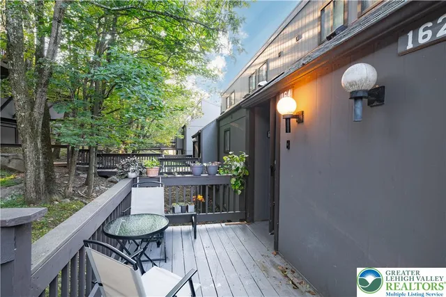 a view of a patio on wooden deck