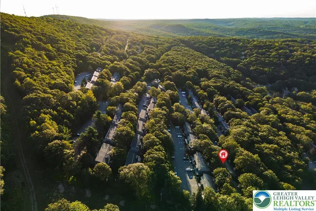 a view of a city with mountain
