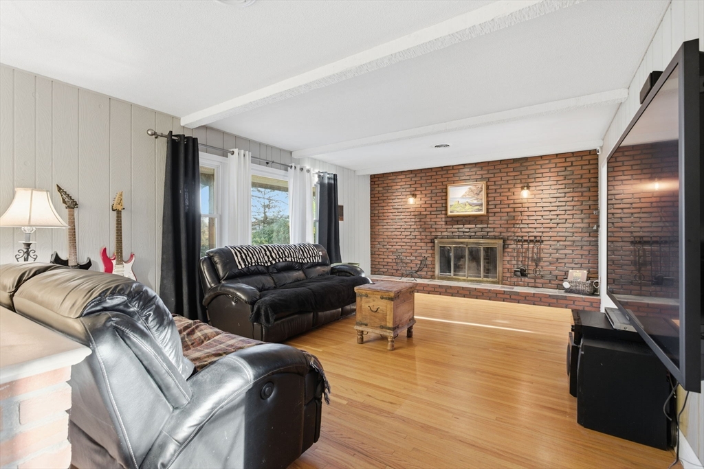 78 Dunstable Road Westford, MA 01886 - Photo 2 of 27 a living room with furniture and a large window