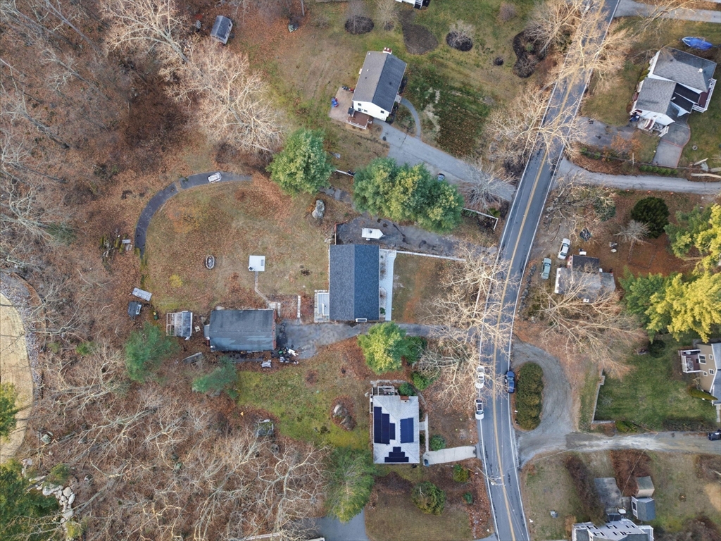 78 Dunstable Road Westford, MA 01886 - Photo 22 of 27 a front view of a house with a yard
