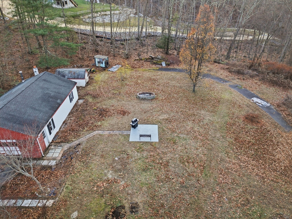 78 Dunstable Road Westford, MA 01886 - Photo 26 of 27 a view of a dry yard with wooden fence