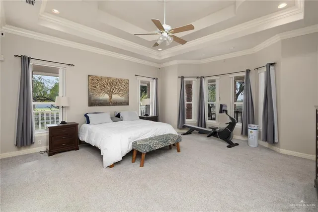 a bath tub sitting in a bathroom next to a window