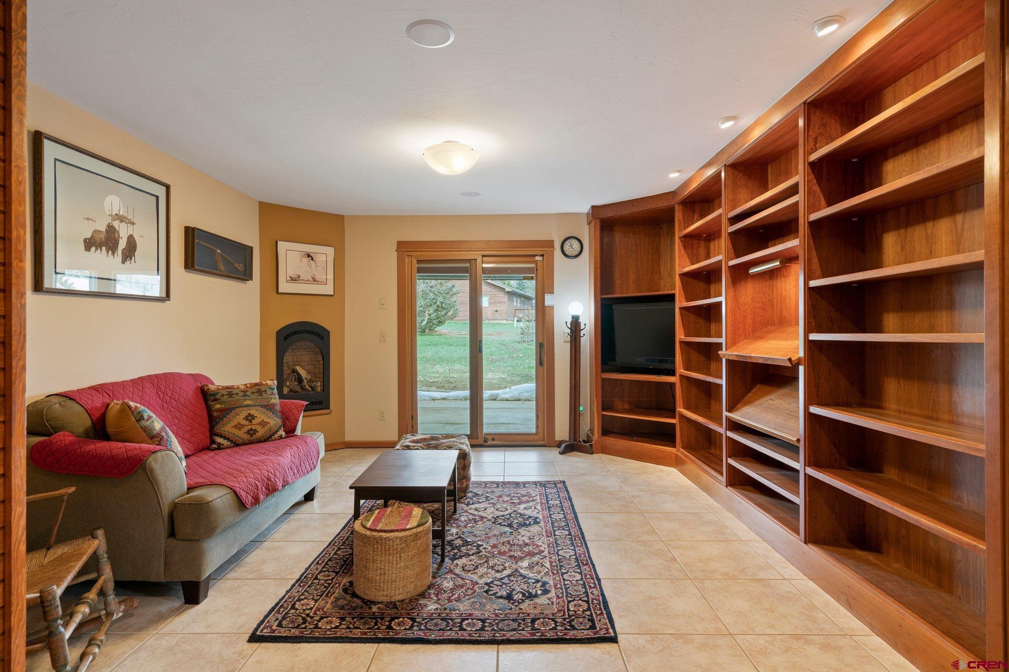 333 Pine Ridge Loop, Unit 4 Durango, CO 81301 - Photo 21 of 33 a living room with furniture and a rug