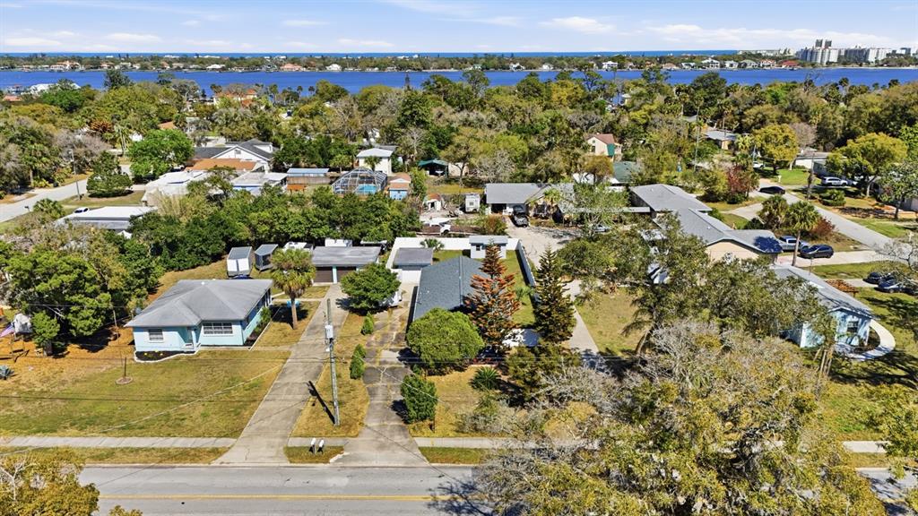 231 North Ridgewood Avenue Ormond Beach, FL 32174 - Photo 49 of 52 an aerial view of residential houses with outdoor space