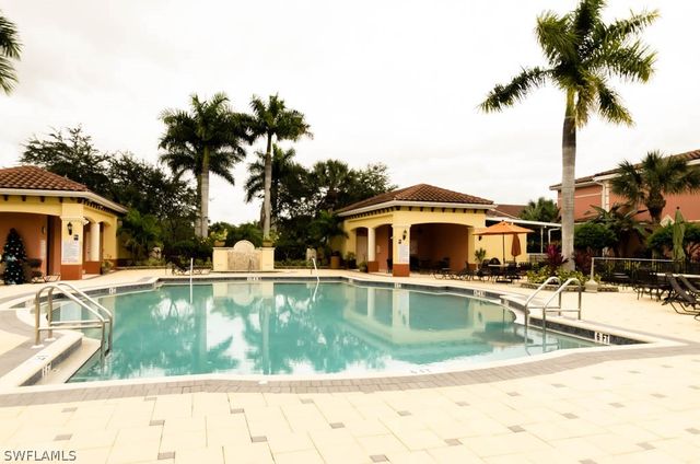 a view of a house with a swimming pool