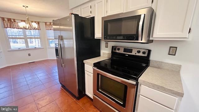 100 Greenbriar Circle Cross Junction, VA 22625 - Photo 24 of 79 a kitchen with granite countertop a stove microwave and refrigerator