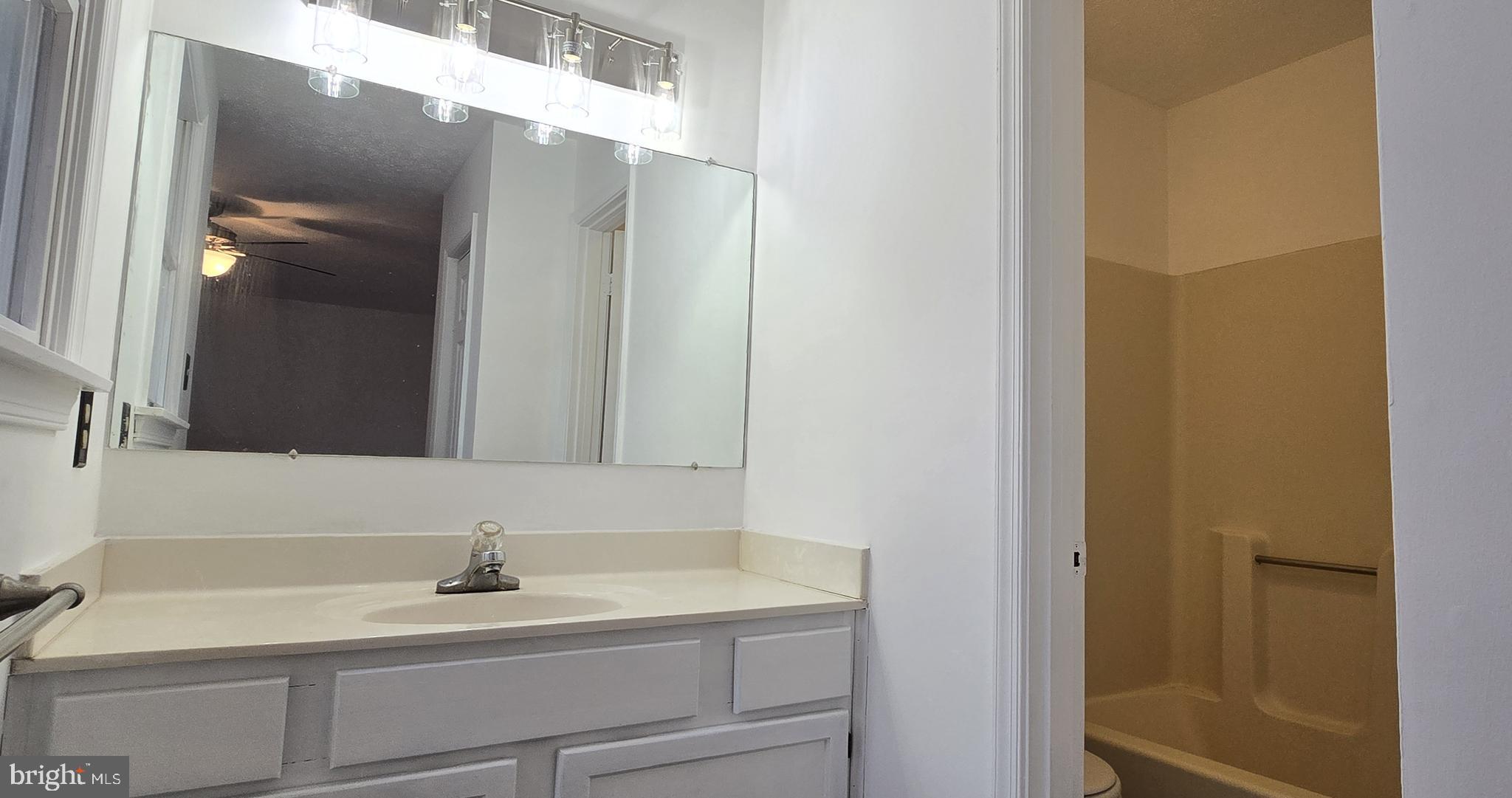 100 Greenbriar Circle Cross Junction, VA 22625 - Photo 31 of 79 a bathroom with a sink and a mirror