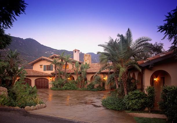 2222 Gibraltar Road Santa Barbara, CA 93105 - Photo 2 of 3 a front view of a house with a yard and garage