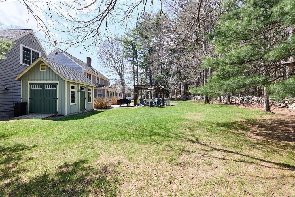 58 Buttercup Lane Hanover, MA 02339 - Photo 30 of 35 a view of a house with yard and tree s
