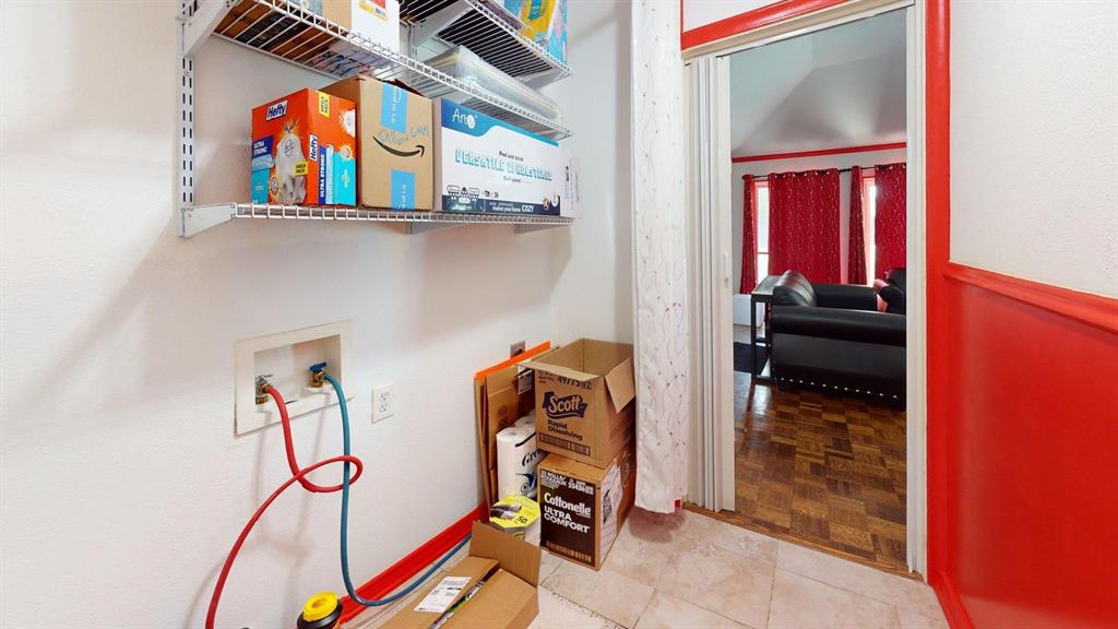1206 South Clark Road Duncanville, TX 75137 - Photo 15 of 38 a view of walk in closet with clothes and shoes