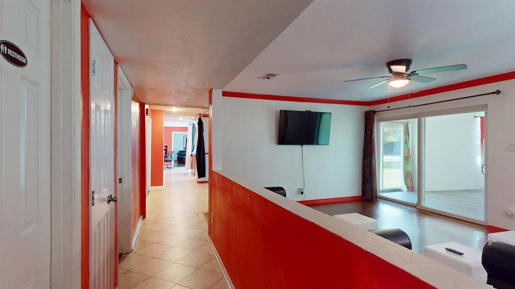 1206 South Clark Road Duncanville, TX 75137 - Photo 17 of 38 a hallway with mirror