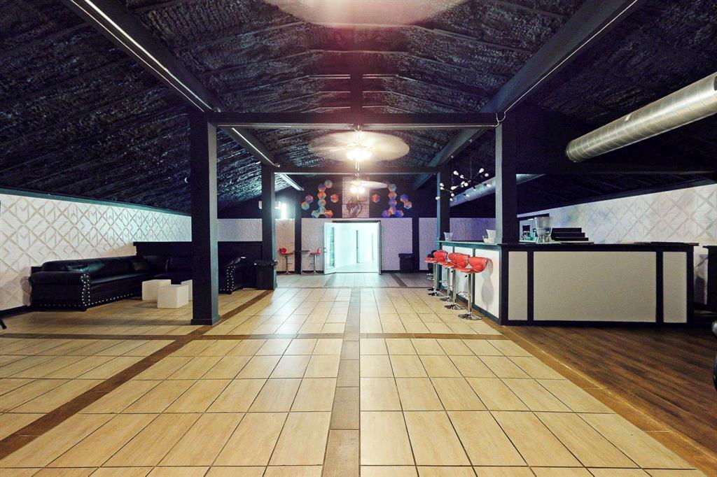 1206 South Clark Road Duncanville, TX 75137 - Photo 32 of 38 a view of an empty room with wooden floor