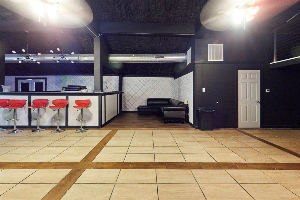 1206 South Clark Road Duncanville, TX 75137 - Photo 36 of 38 a view of a hall with the car parked