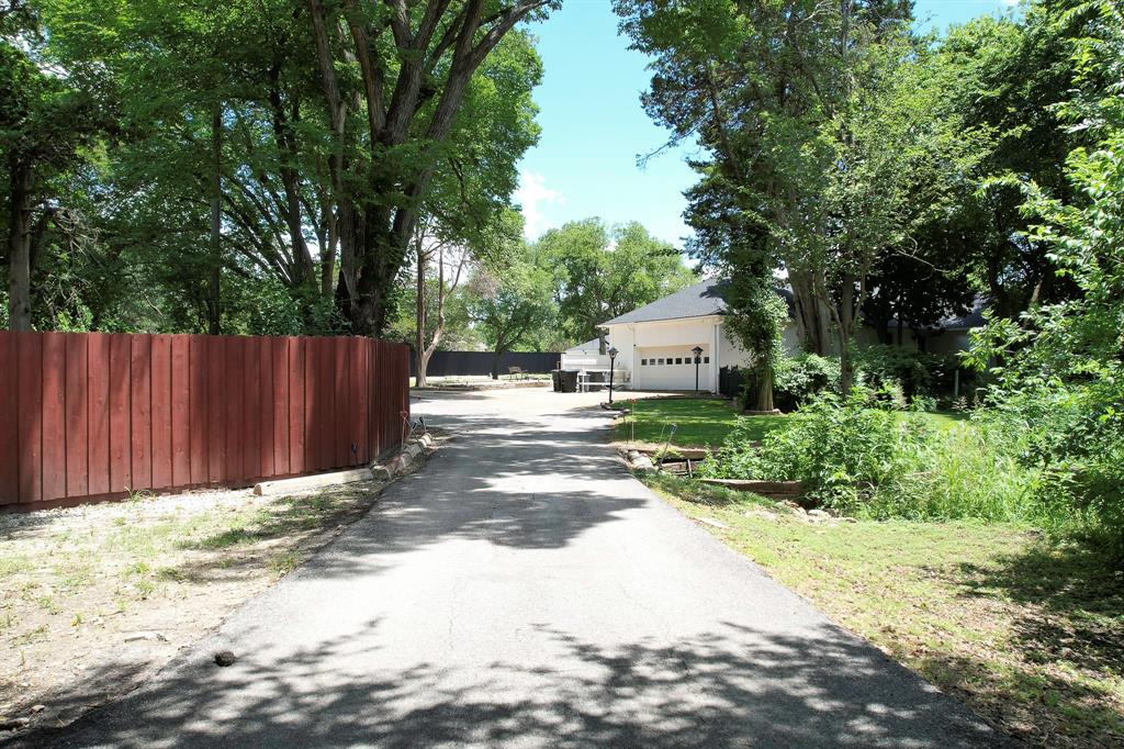1206 South Clark Road Duncanville, TX 75137 - Photo 6 of 38 a view of a back yard