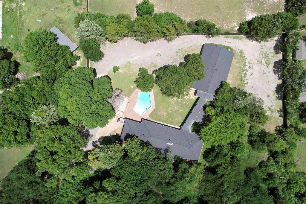 1206 South Clark Road Duncanville, TX 75137 - Photo 8 of 38 an aerial view of a house with a yard