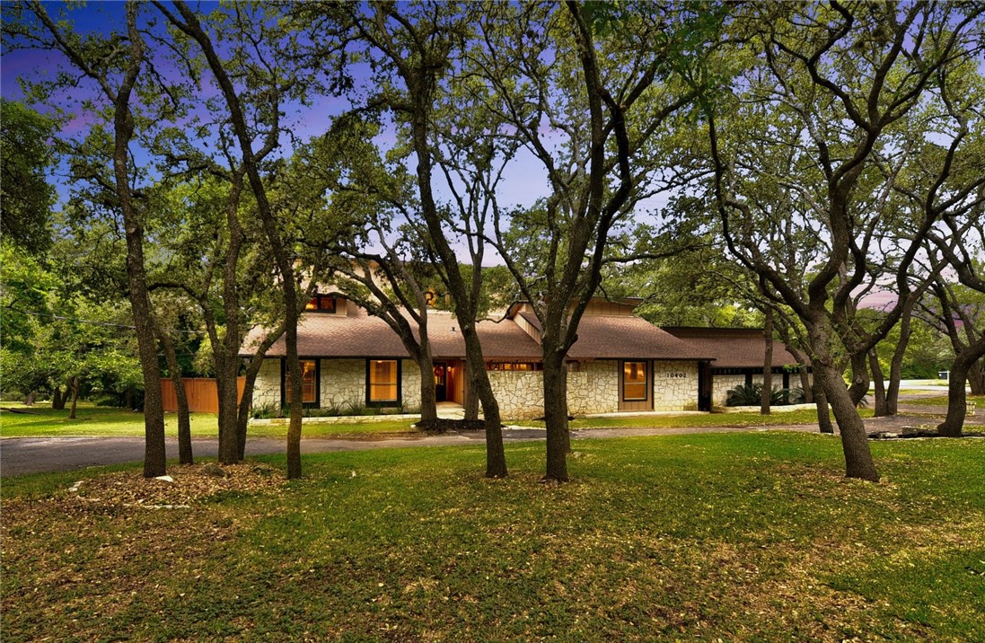 10402 D-K Ranch Road Austin, TX 78759 - Photo 1 of 1 a front view of a house with a yard