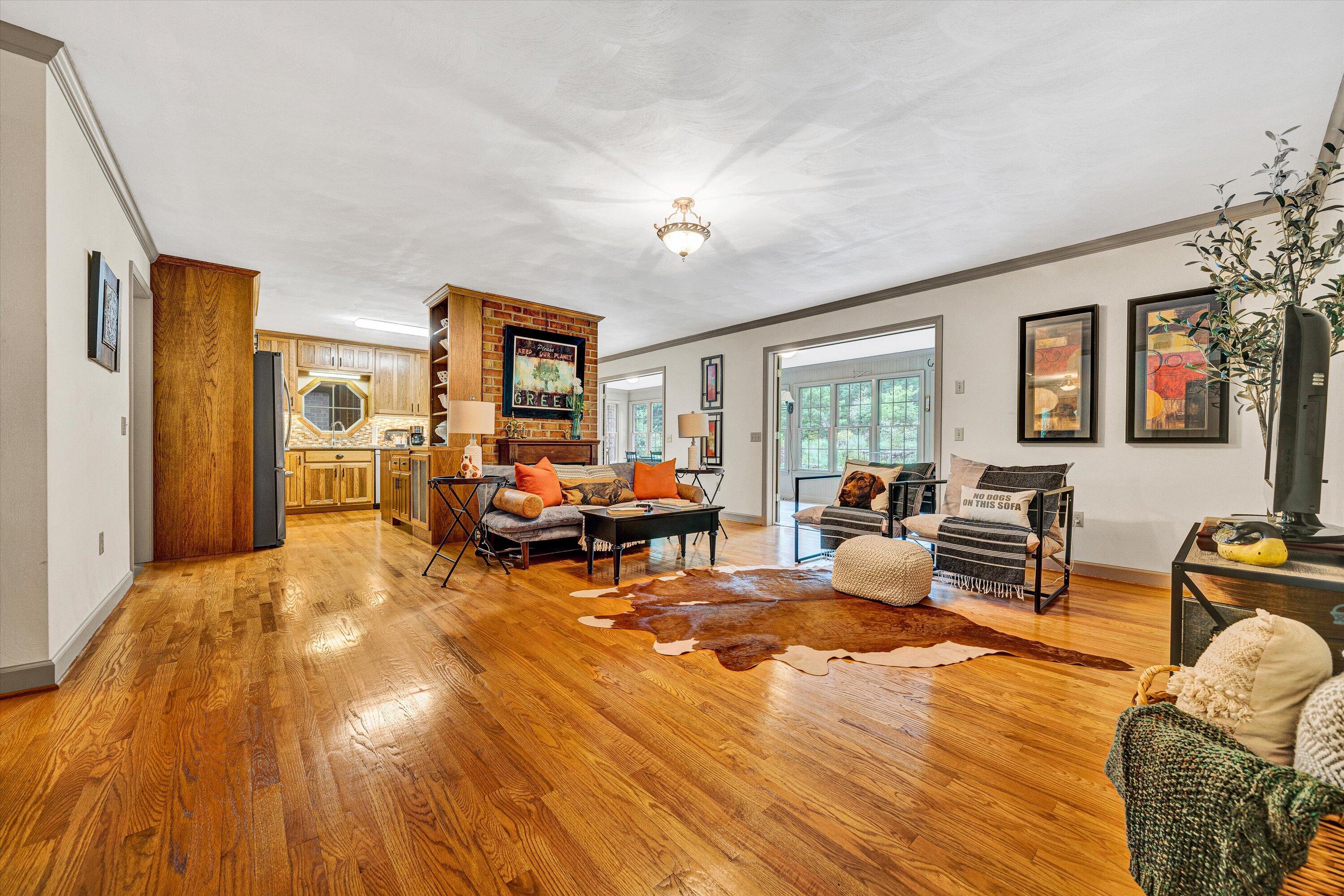 5531 Bethlehem Road Boones Mill, VA 24065 - Photo 12 of 69 a living room with furniture and wooden floor
