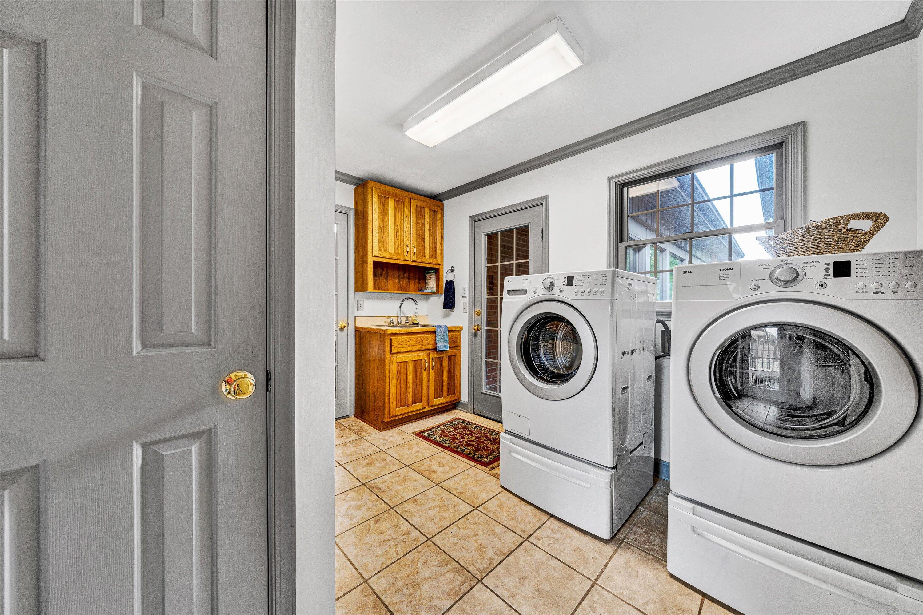 5531 Bethlehem Road Boones Mill, VA 24065 - Photo 23 of 69 a utility room with dryer and washer