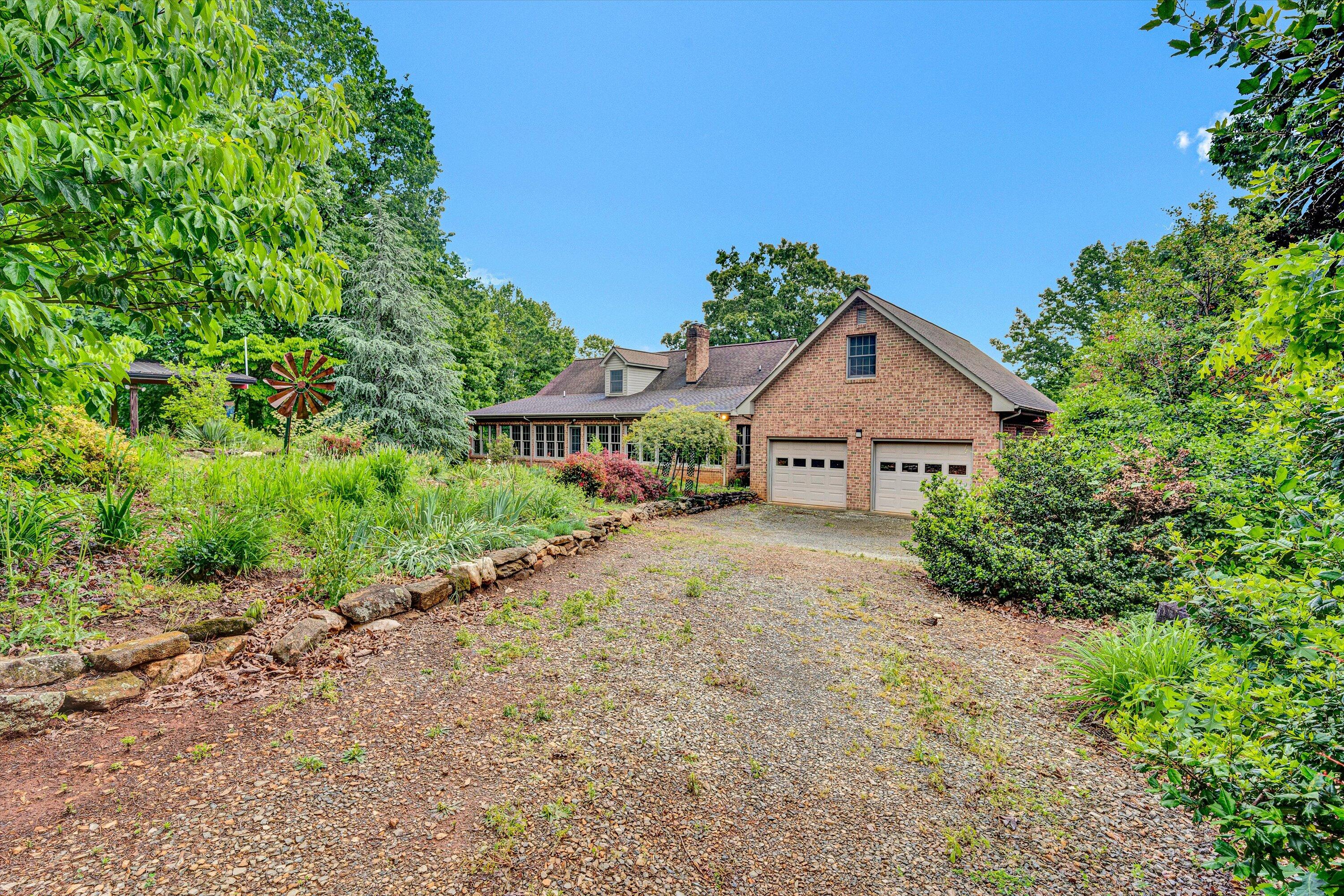5531 Bethlehem Road Boones Mill, VA 24065 - Photo 41 of 69 a view of a house with a yard and large trees