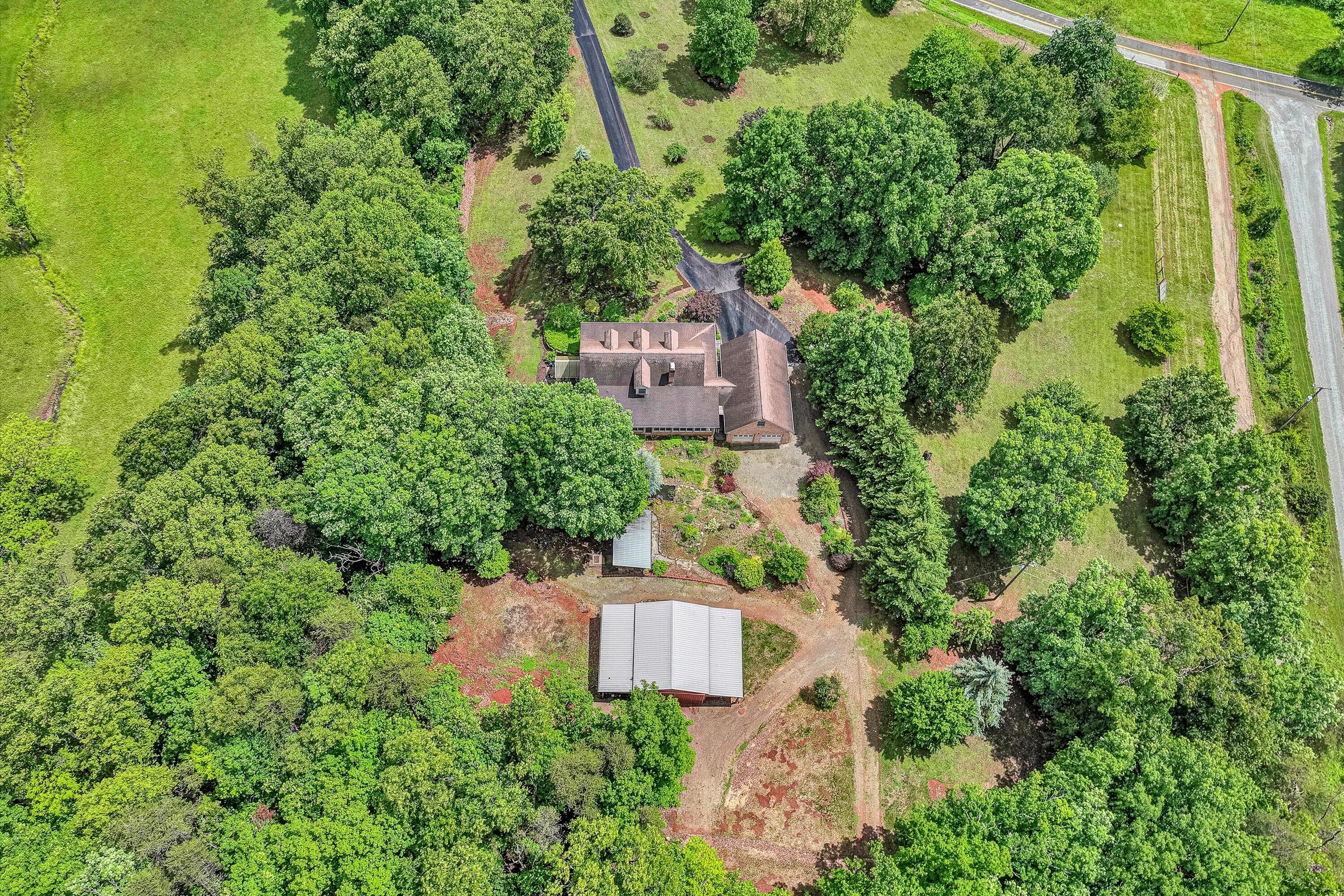 5531 Bethlehem Road Boones Mill, VA 24065 - Photo 60 of 69 an aerial view of a house with a yard