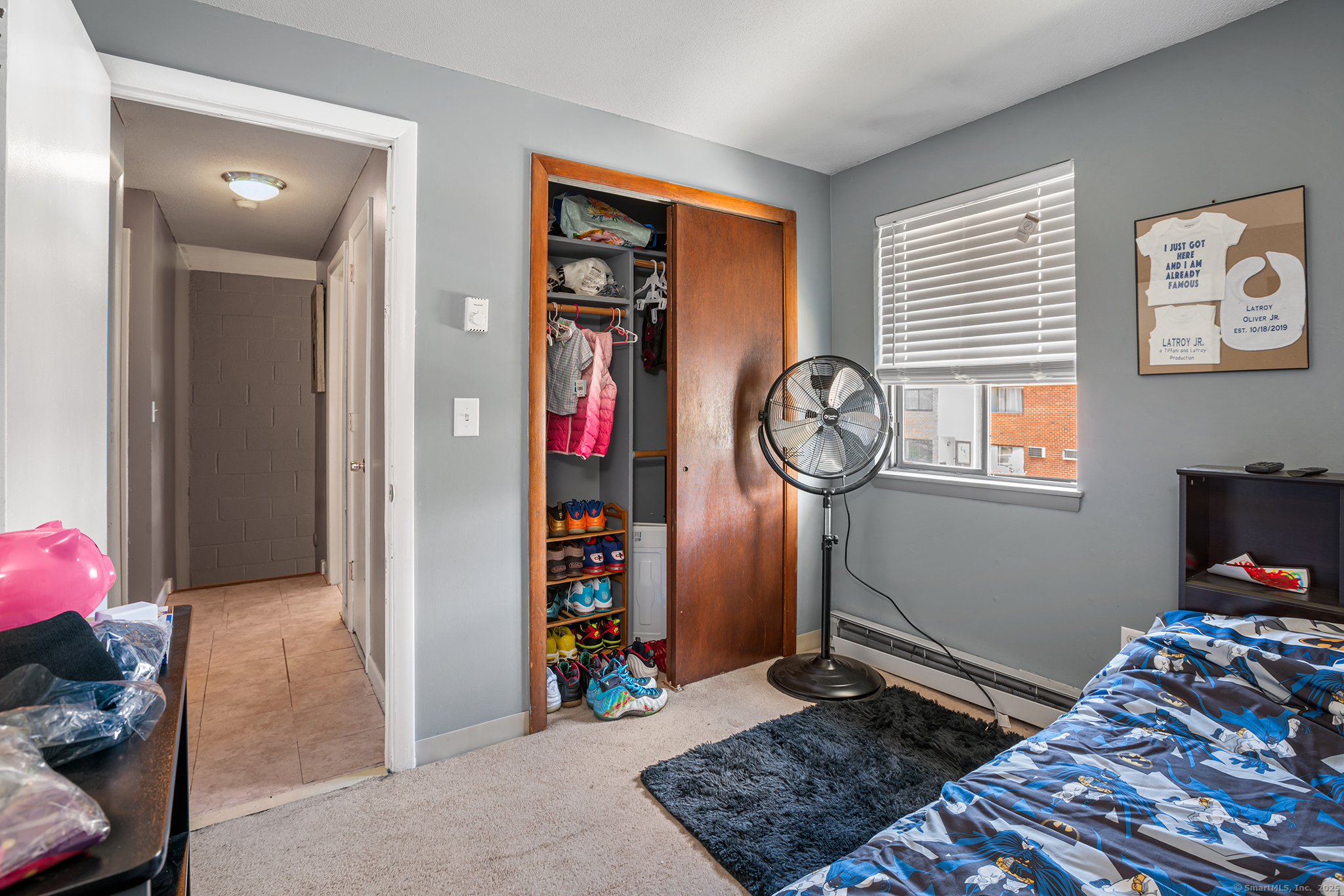 205 Homestead Street, Unit B3 Manchester, CT 06042 - Photo 14 of 26 a bed room with a bed and a window