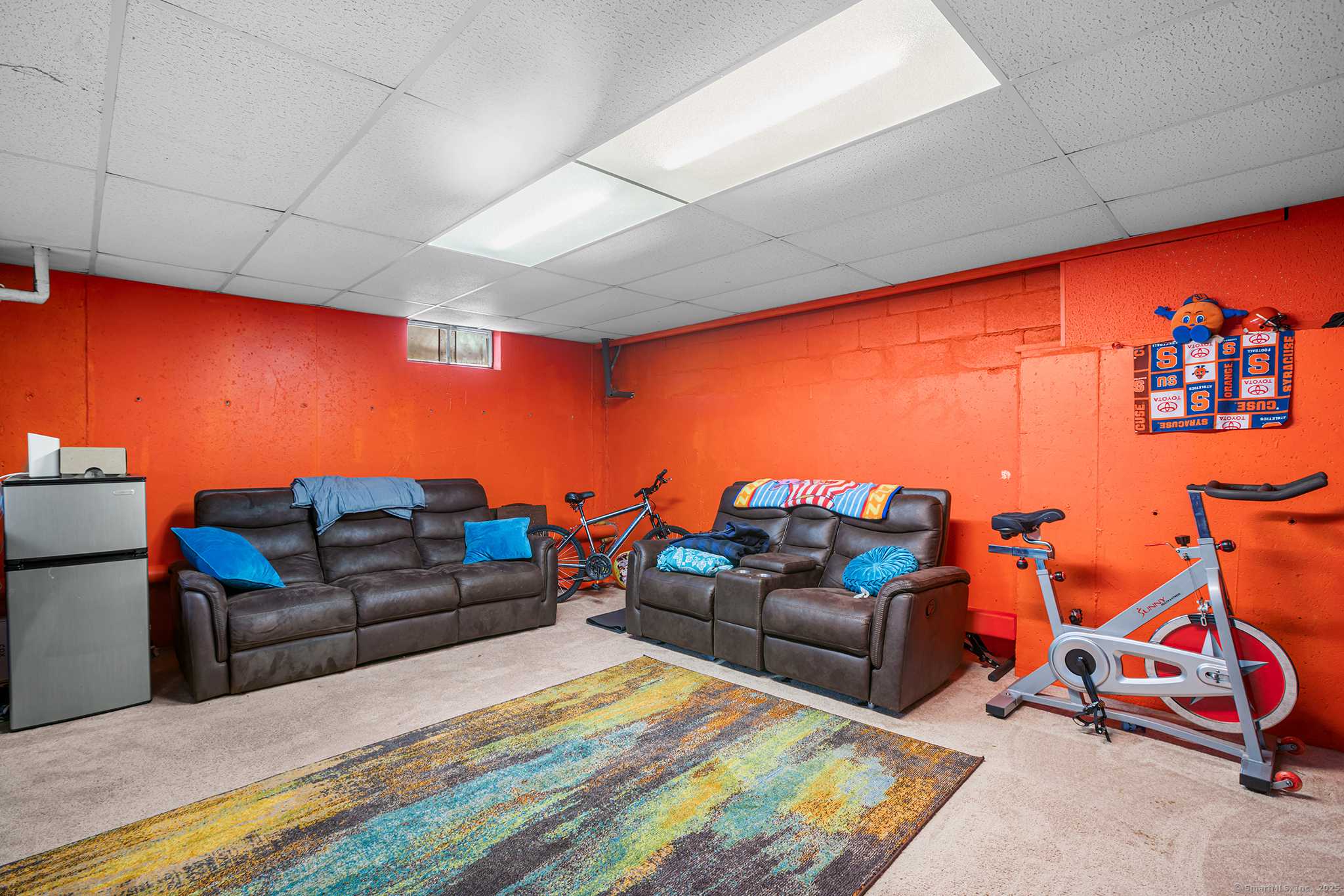 205 Homestead Street, Unit B3 Manchester, CT 06042 - Photo 18 of 26 a living room with furniture and a flat screen tv