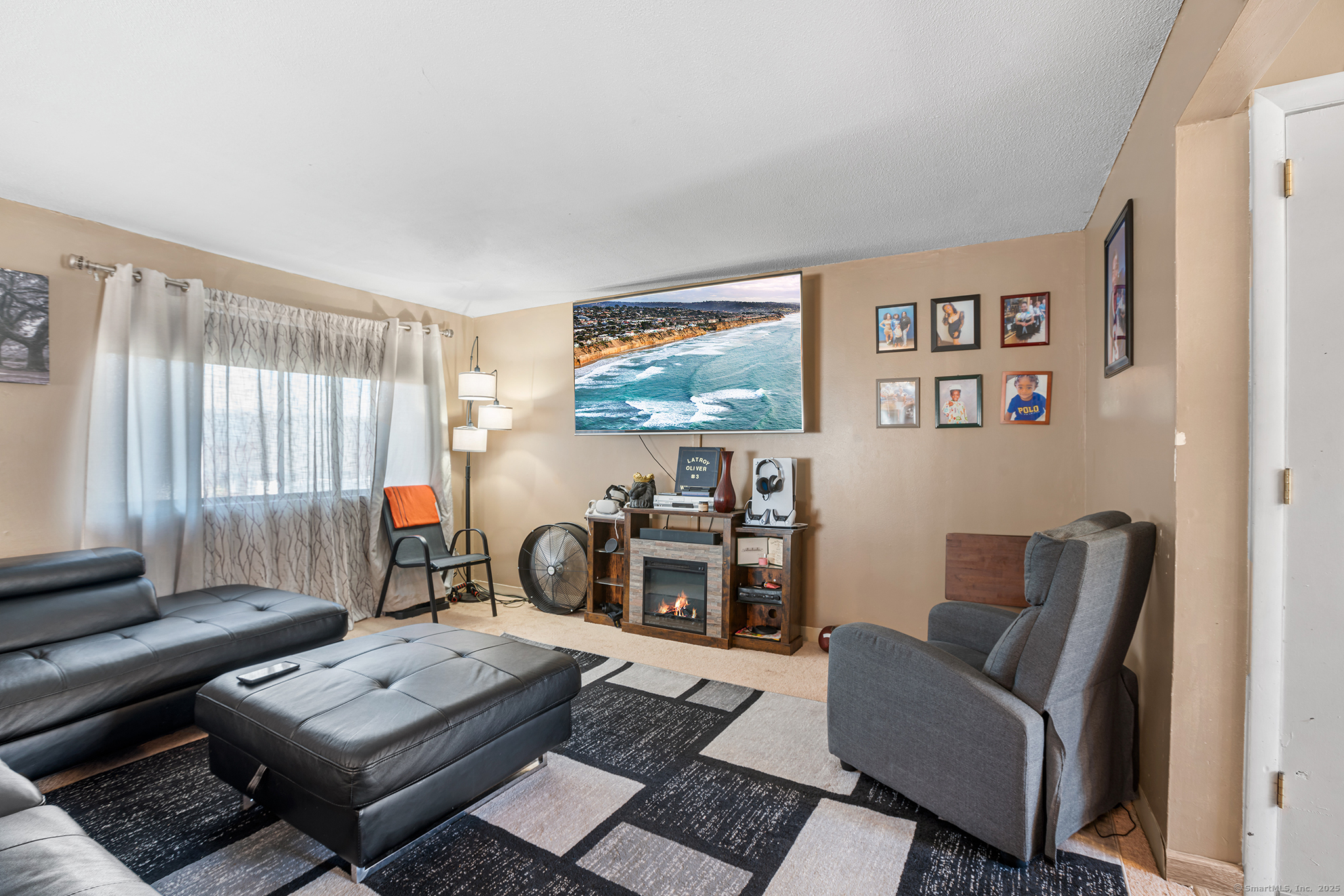205 Homestead Street, Unit B3 Manchester, CT 06042 - Photo 2 of 26 a living room with furniture and a window