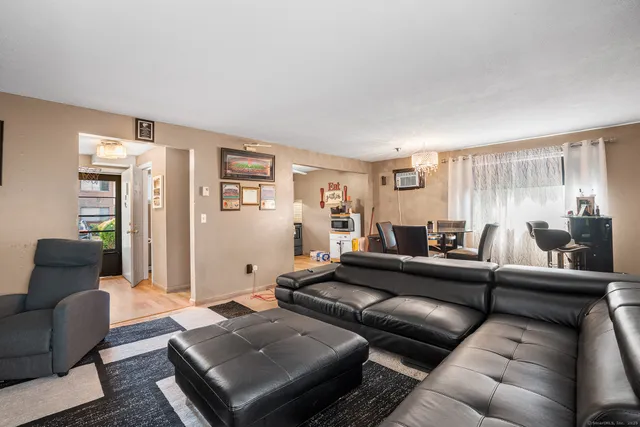 a living room with furniture and a couch
