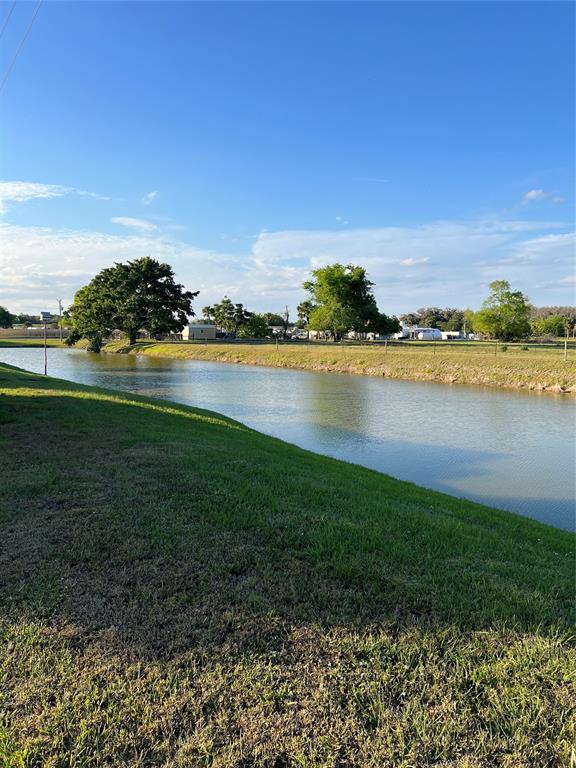 a view of a lake with a city