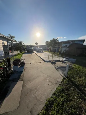 a view of a street with an ocean view