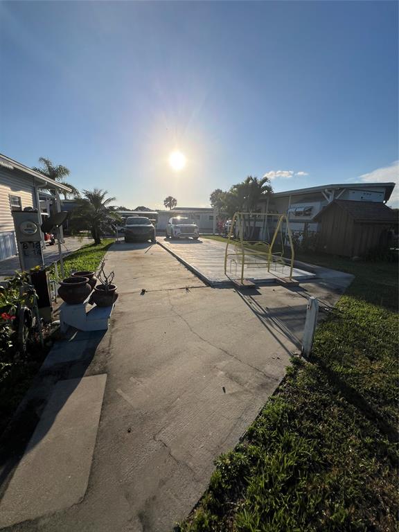 6681 Southeast 51st Street Okeechobee, FL 34974 - Photo 3 of 4 a view of a street with an ocean view