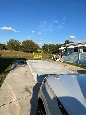 a view of a swimming pool with an ocean view