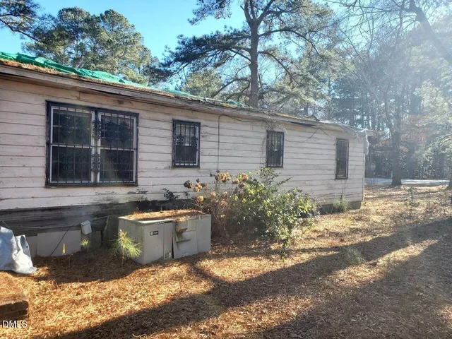 a house view with a outdoor space