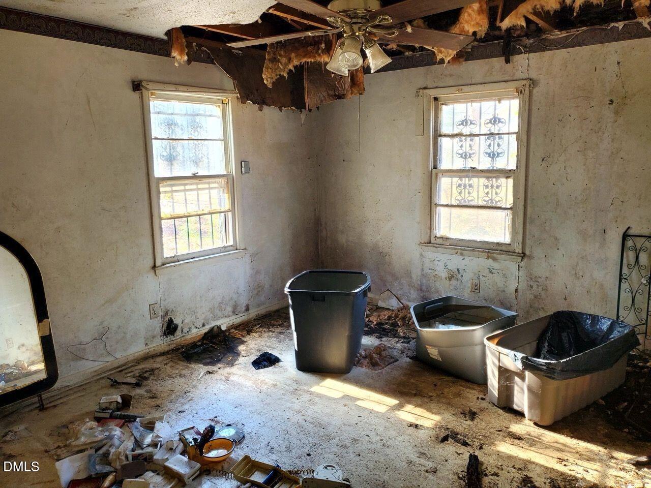 308 Nustreet Road Enfield, NC 27823 - Photo 5 of 6 a living room with furniture and a window