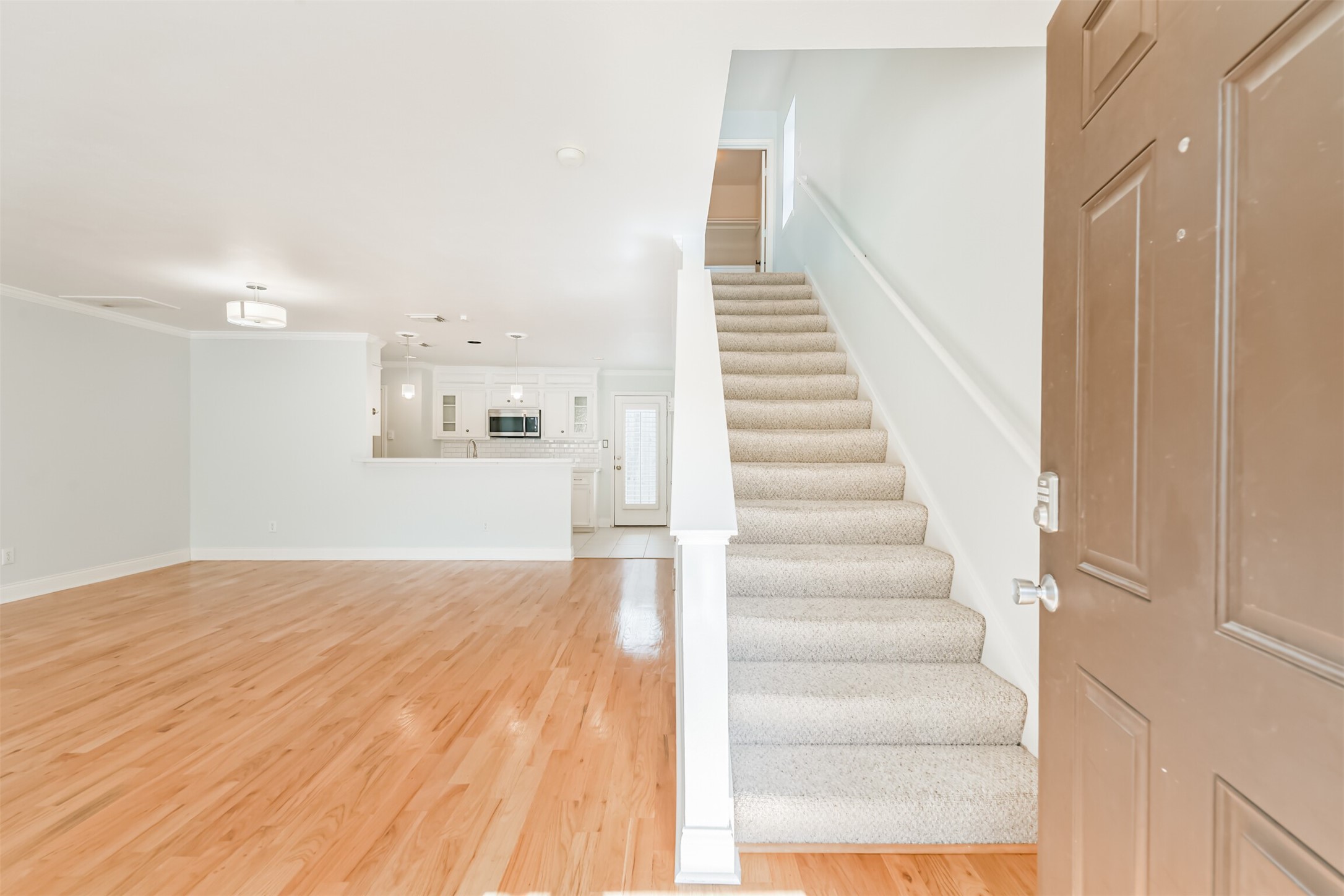 738 Redwing Pl Drive Houston, TX 77009 - Photo 8 of 23 Enter this airy, light-filled open concept living area.