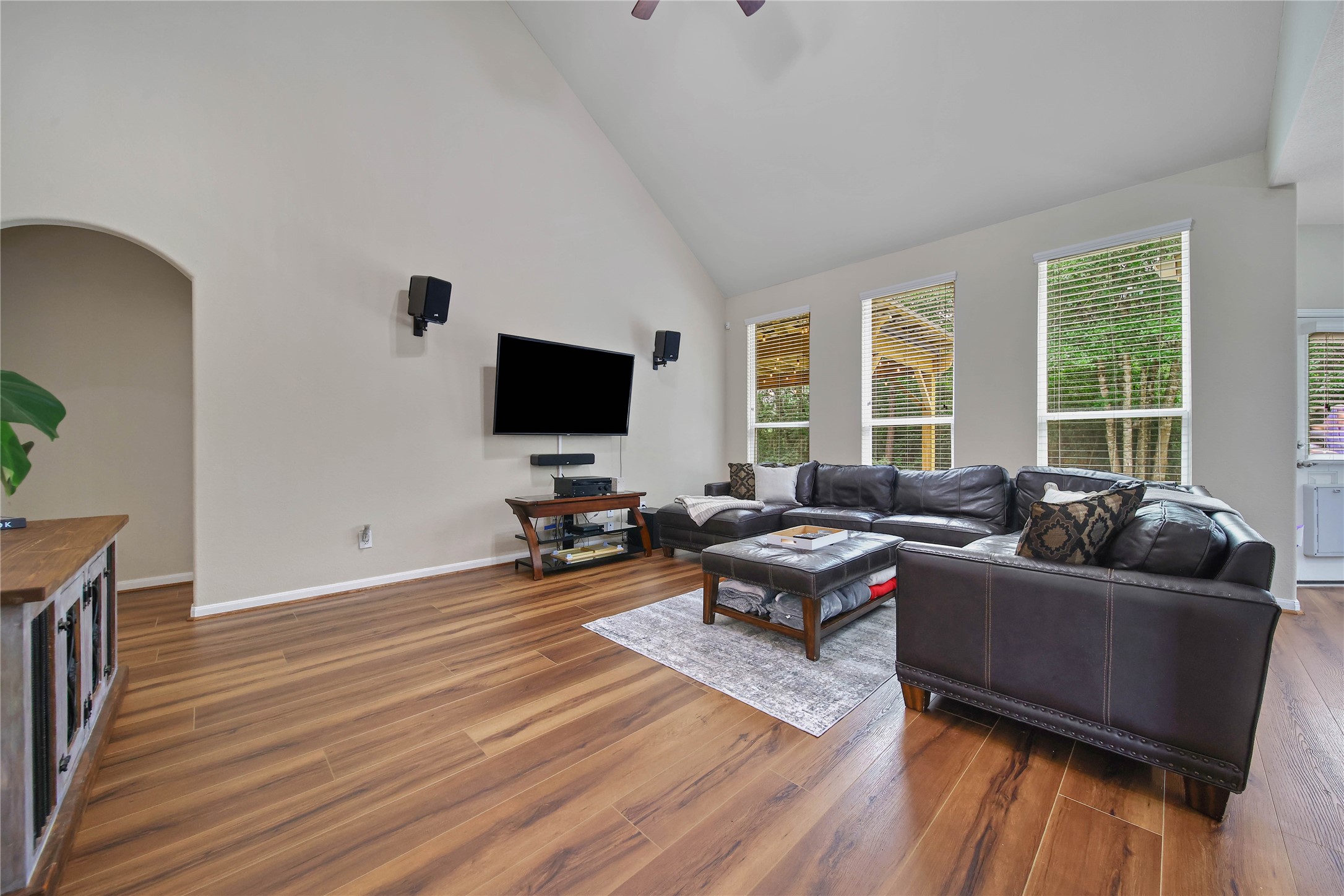 9223 Wapiti Trail Conroe, TX 77303 - Photo 14 of 45 a living room with furniture and a flat screen tv