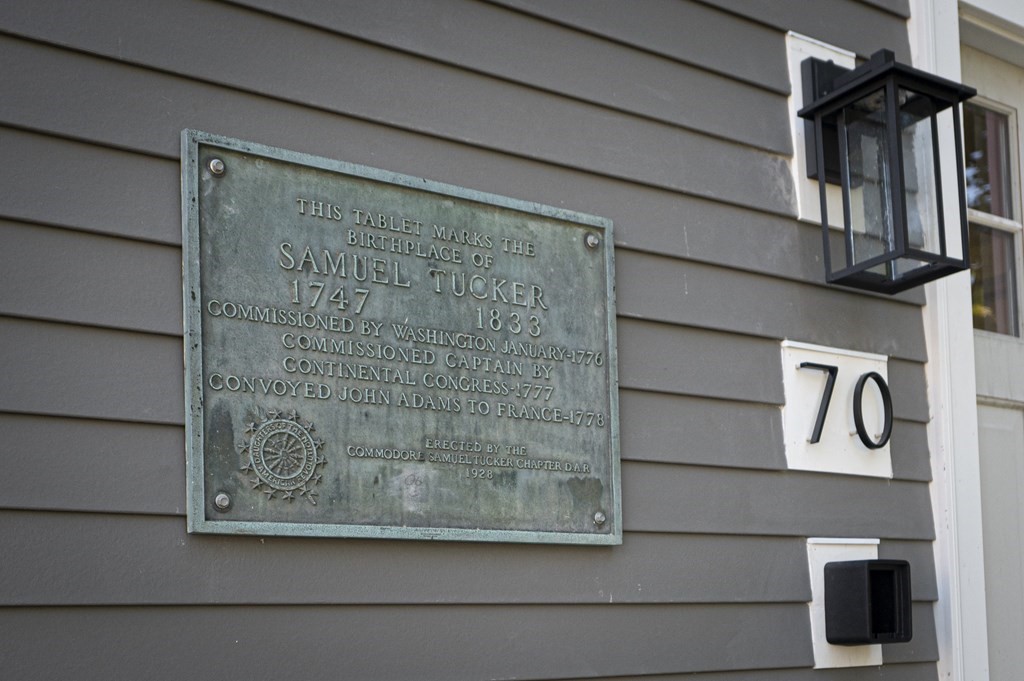 70 Prospect Street, Unit 3 Marblehead, MA 01945 - Photo 1 of 1 a view of a door and wooden street