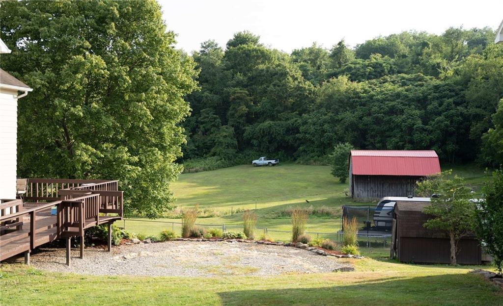 467 Hickory Square Road Connellsville, PA 15425 - Photo 3 of 17 an outdoor space with swimming pool and furniture