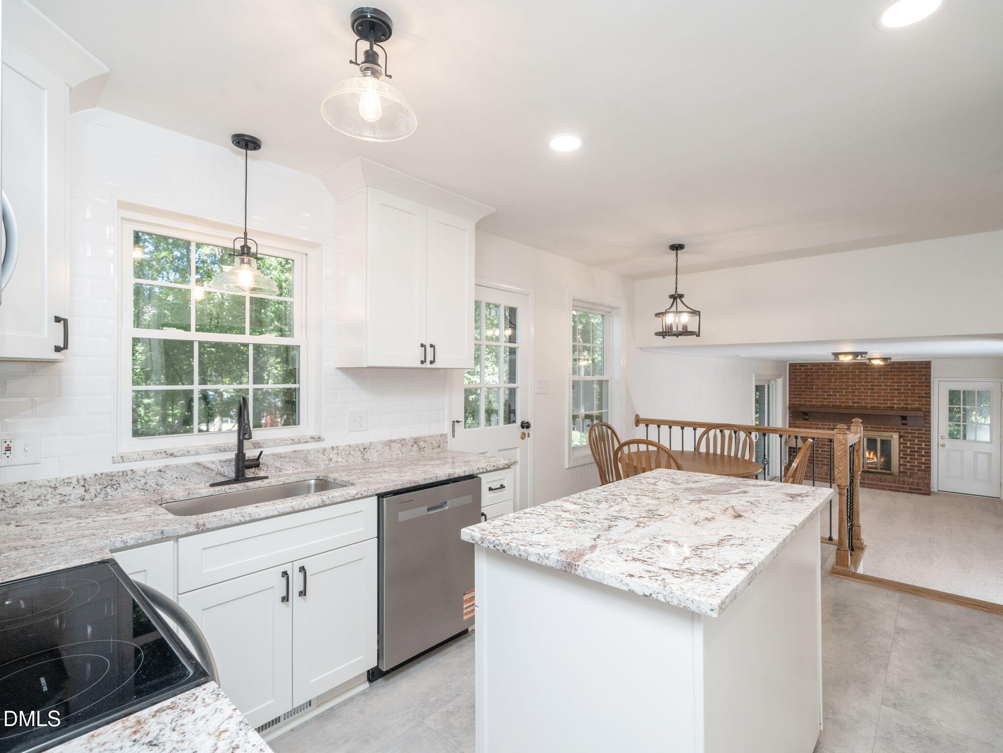 705 Villawood Court Raleigh, NC 27615 - Photo 11 of 31 This gorgeous kitchen has been renovated and boasts new cabinets with granite counter tops and new stainless steel appliances.