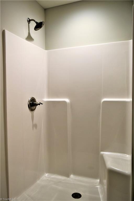 7719 Athens Road Stokesdale, NC 27357 - Photo 10 of 16 Master bathroom walk-in shower