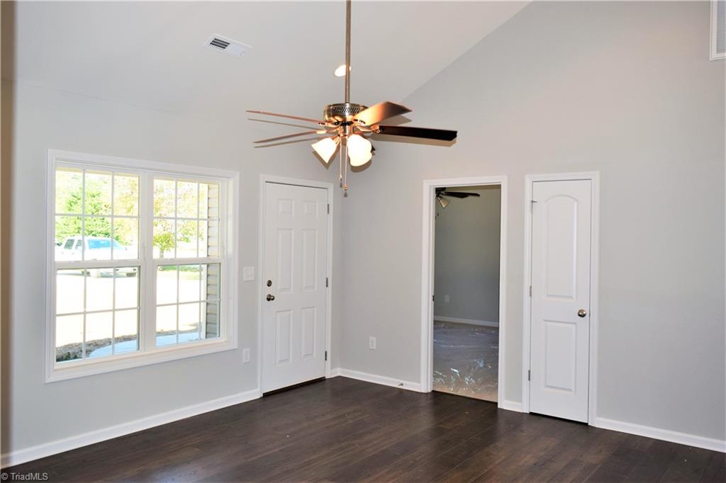 Living room with vaulted ceiling