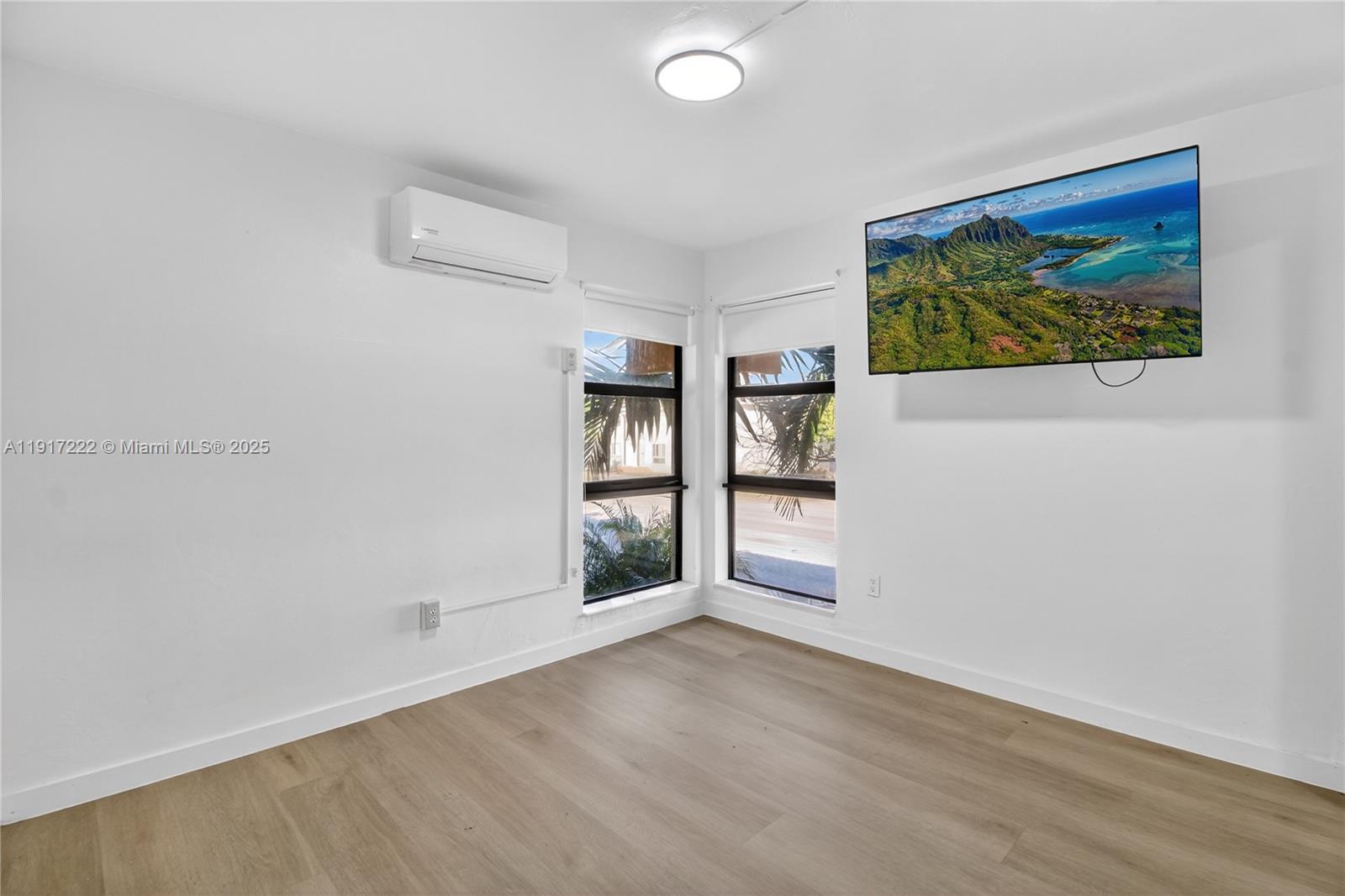 1600 South Le Jeune Road, Unit 7 Coral Gables, FL 33134 - Photo 12 of 20 wooden floor in an empty room