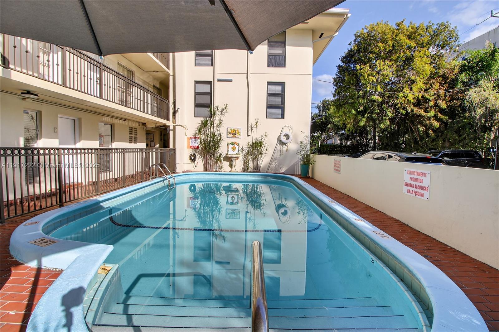 1600 South Le Jeune Road, Unit 7 Coral Gables, FL 33134 - Photo 17 of 20 a view of balcony with a potted plant