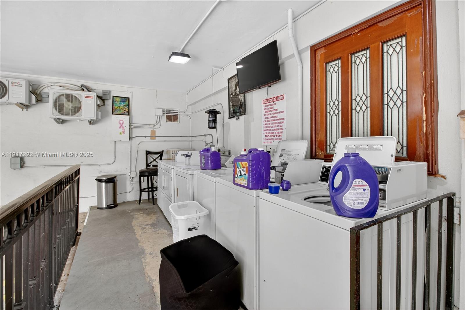 1600 South Le Jeune Road, Unit 7 Coral Gables, FL 33134 - Photo 19 of 20 a view of entryway with furniture and clutter