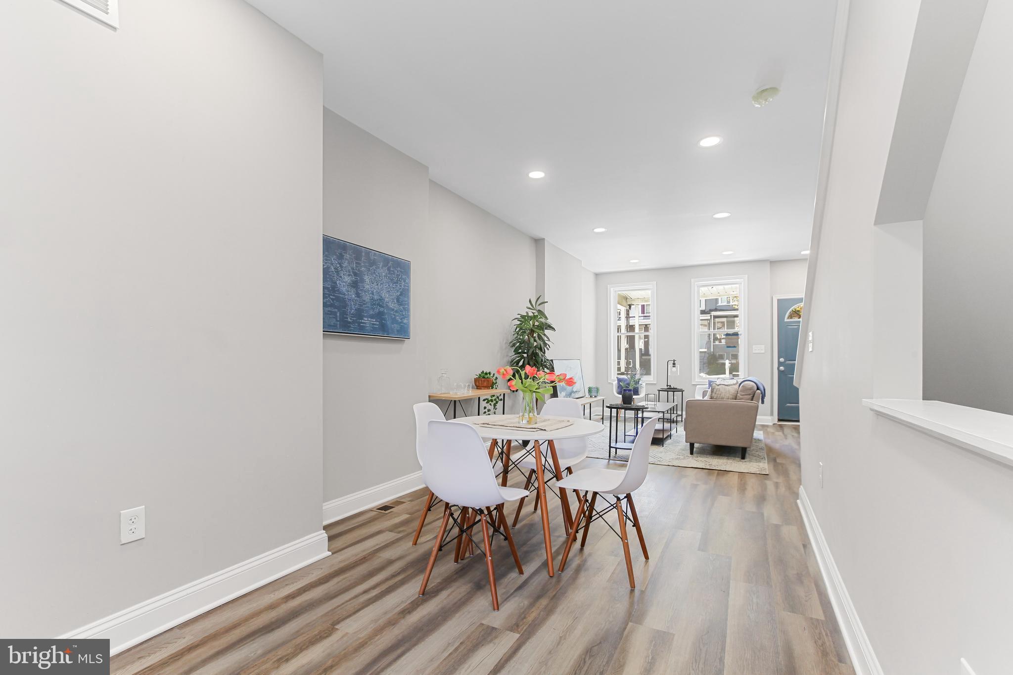 2712 Mosher Street Baltimore, MD 21216 - Photo 13 of 37 a view of a dining room with furniture and wooden floor