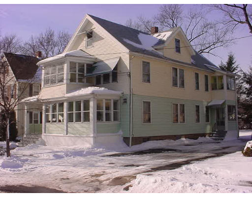 38-40 Silver Street Springfield, MA 01107 - Photo 1 of 1 a view of a white house with a yard and plants